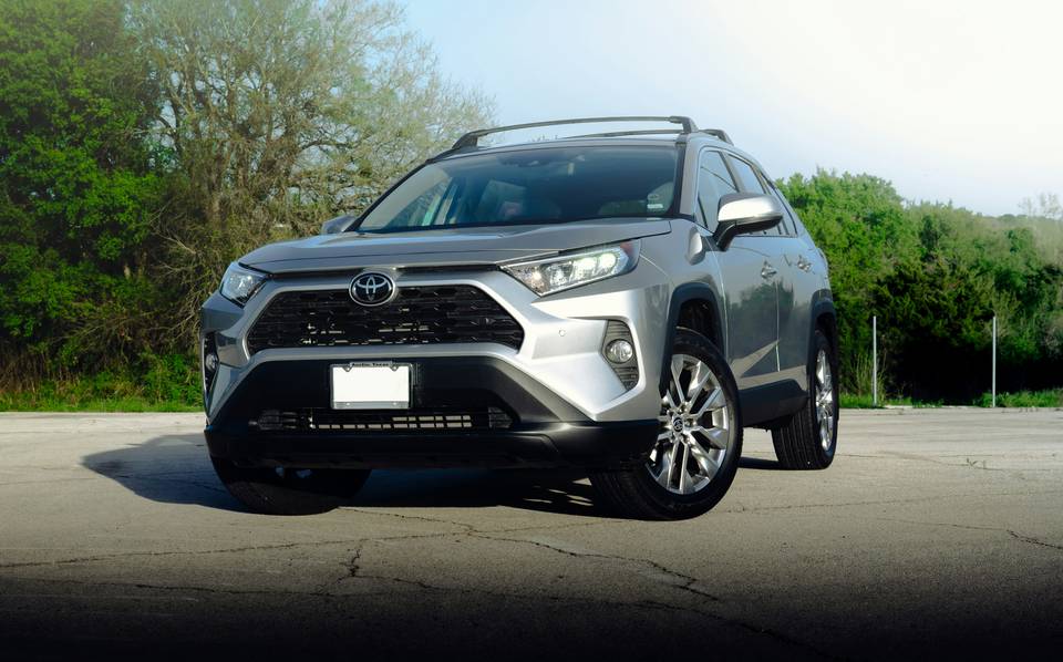 Silver Toyota RAV4 seen from the front in an empty car park